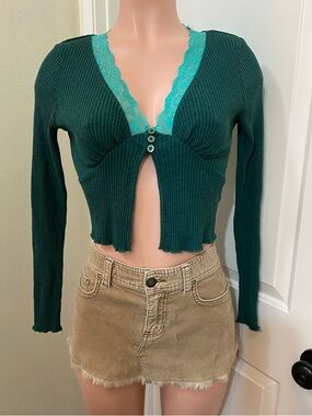 Urban outfitters dark green with a teal lace half button up top.